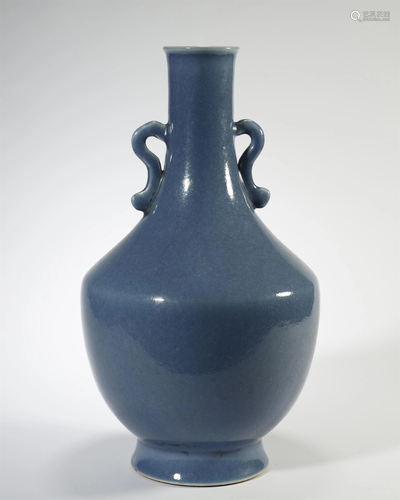 A BLUE GLAZED TWO HANDLE VASE