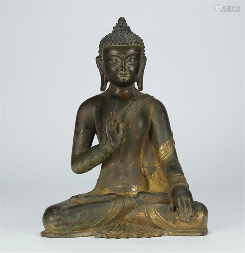 A EARLY GILT BRONZE FIGURE OF SAKY…