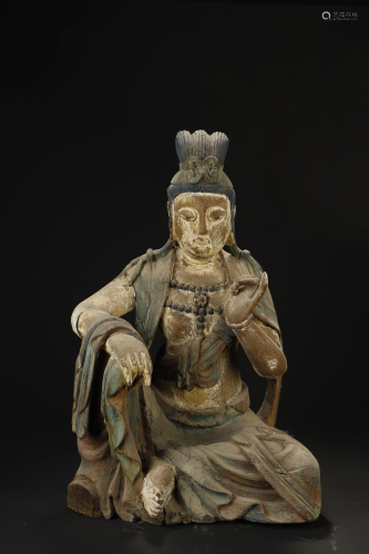 A LARGE WOOD CARVED GUANYING FIG…