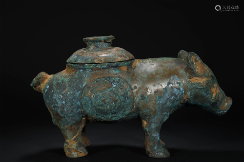 A BRONZE COVERED CONTAINER IN…