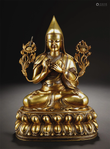 A SILVER INLAID GILT BRONZE FIGURE OF TSO…