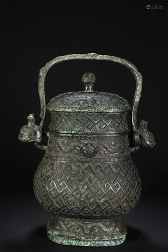 A BRONZE RITUAL WINE VESSEL W/COVER