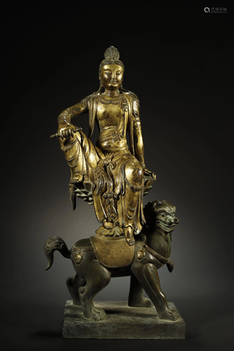 A LARGE GILT BRONZE FIGUER OF GUA…