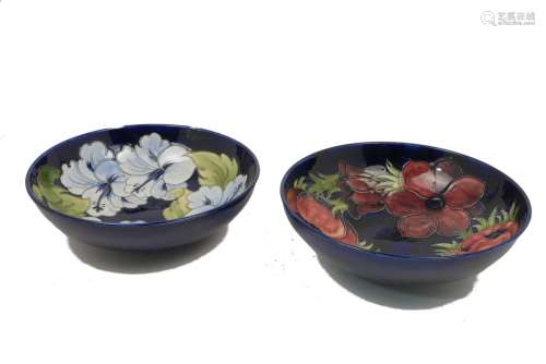 Two large Moorcroft hibiscus and anemone patterned pottery bowls, each with impressed marks and