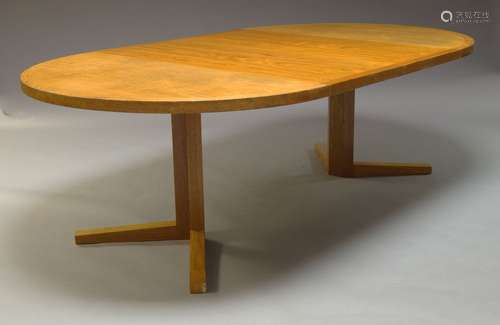 A Danish teak extending dining table by CJ Rosengaarden for Hojre , c.1970, the circular top, with