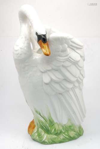 A large Italian pottery vase in the form of a swan, of recent manufacture, 55cm high.Please refer to