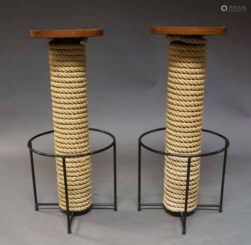 A pair of French rope bar stools, possibly by Audoux-Minet c.1950, the circular seats, on rope bound