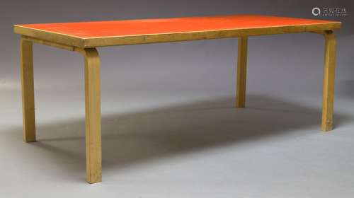 Alvar Aalto, a model 83 dining table for Artek, with red Formica top on, laminated plywood legs,