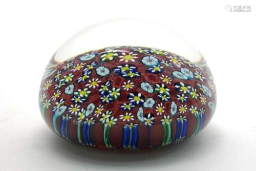 A large Italian Murano glass paperweight, mid/late 20th century, inset to clear glass with white