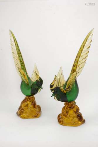 A pair of Italian glass birds, 20th century, the bird with a green body yellow wings and a long