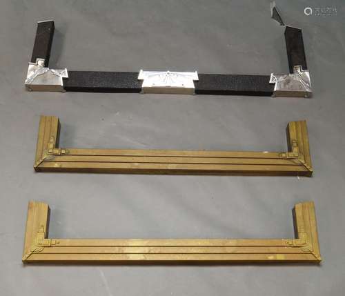 A pair of Art Deco brass fenders, c.1930s-40s, of stepped form with geometric decoration, together