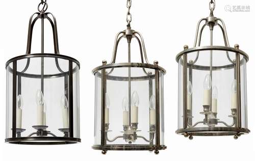 A pair of chromed four light ceiling lanterns c.2000 Of cylindrical form with glass panels; together