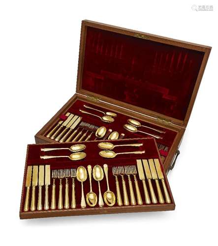 A boxed canteen of silver-gilt cutlery by Carrington & Co., London, the spoons hallmarked London,