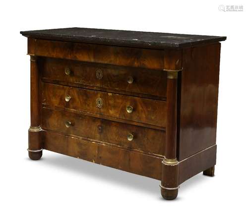 A French Empire mahogany and gilt metal mounted chest, with black marble top over plain frieze