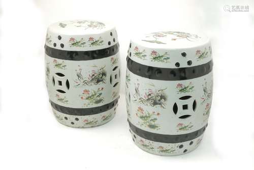 A pair of Chinese Kangxi style famile rose garden seats decorated with peony flowers and foliage,