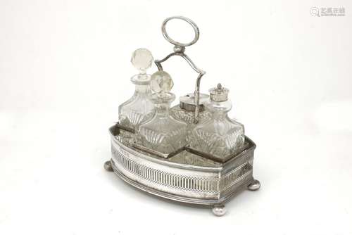 A silver-mounted cruet set, Birmingham, c.1927, JB Chatterley & Sons., the four square-shaped cut