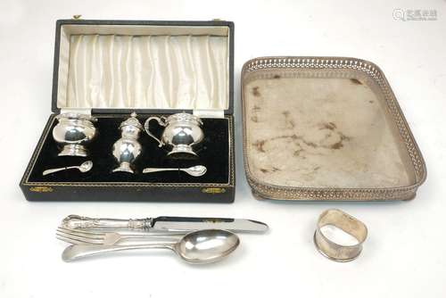 A boxed small silver condiment set, Birmingham, c.1957, Adie Brothers, comprising two blue glass-