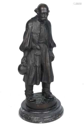 Kalman Beszedes, Hungarian, 1832-1893, a bronze model of a man in Hungarian Costume holding a