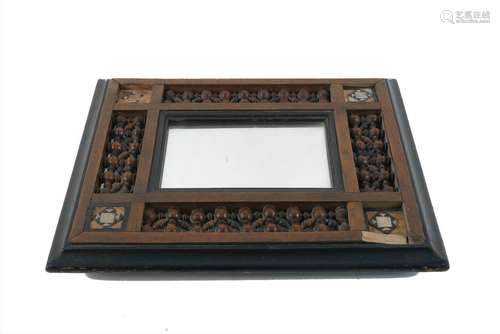 A mashrabiya work easel form mirror frame, 20th century, with four lattice work panels, each with