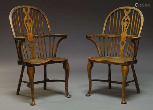 A pair of elm and beech Windsor armchairs, second half 20th Century, each with shaped and pierced