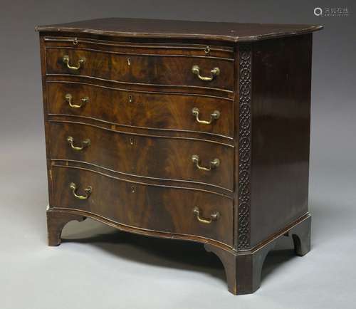 A George III style mahogany serpentine fronted chest of four long graduated drawers, late 19th