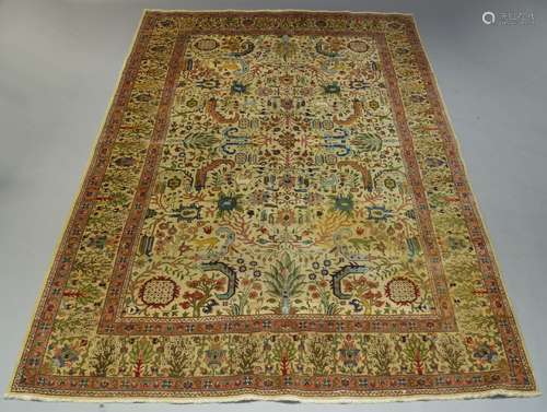 A West Persian carpet, mid to late 20th Century, with all over design incorporating trees,