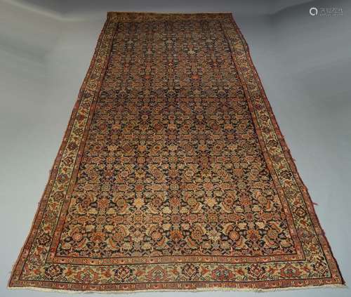 A Fereghan gallery rug, early to mid 20th Century, with all over Herati design in Indigo field, with