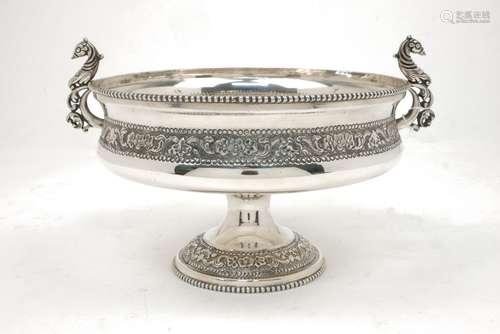 An impressive Indian silver presentation bowl with stylised bird handles, the body richly