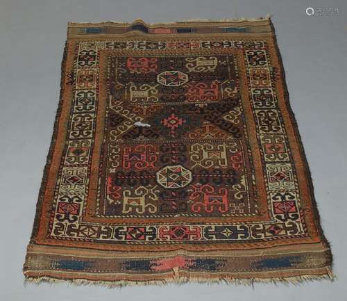 Three Turkmen rugs and a Turkish wool rug(4)80