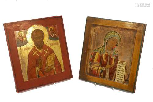 A Russian icon of St Nicholas the Wonder worker, 20th century, together with Christ and Mary, 32 x