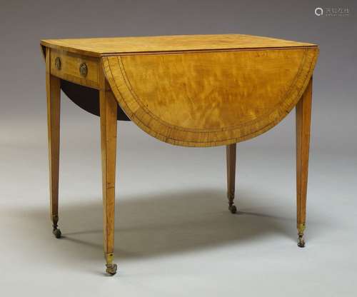 A Regency satinwood and ebony strung Pembroke table, the rectangular top with two drop leaves