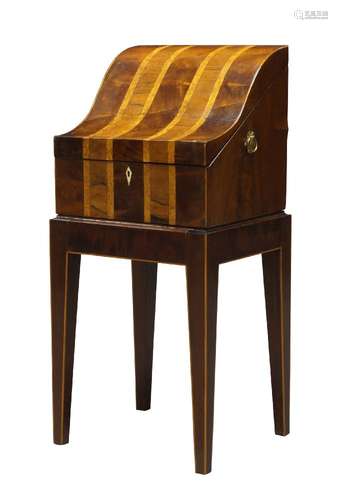 A George III mahogany workbox, later converted to a decanter box, the downward sloping serpentine