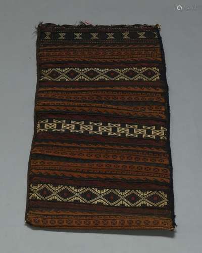 Four Turkmen rectangular tent bags, a small Turkmen rug, and another small rug (6)80