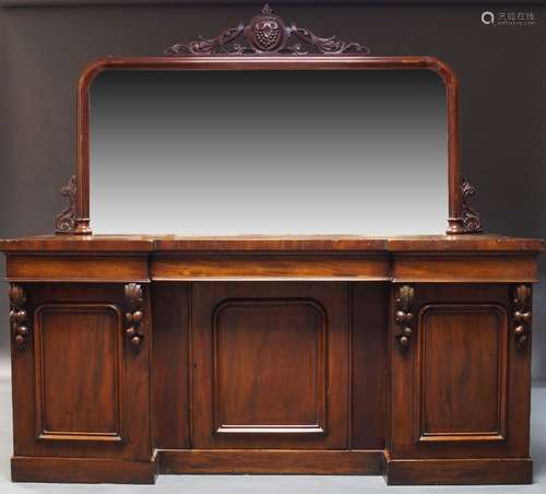 A Victorian mahogany inverse breakfront sideboard, with raised mirrored back centred by pierced