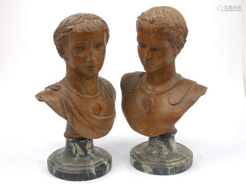 A pair of wooden carved busts of Roman emperors, 19th century mounted on wooden bases, 32cm high (