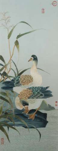 A large Chinese silk embroidered picture depicting two ducks in a landscape, framed, 72cm x 28cm,