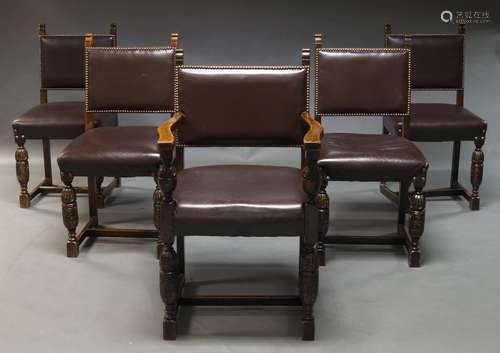 A set of five Jacobean style oak chairs, early 20th Century, upholstered in burgundy vinyl material,