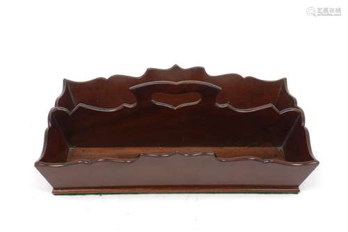 An Edwardian mahogany two-section cutlery tray, with carved pierced bordering and single shaped