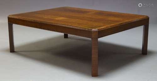 A George III style mahogany and brass inlaid coffee table, late 20th Century, the canted rectangular