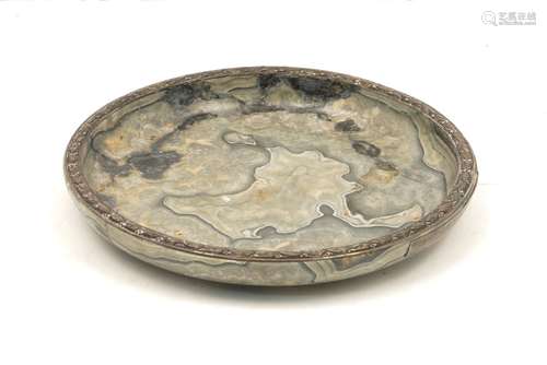 A green hardstone bowl bearing a Swedish silver mount by W. A. Bolin, 1924, depicting a laurel