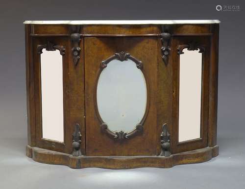 A Victorian walnut and mirrored credenza, surmount with white serpentine marble top, above three