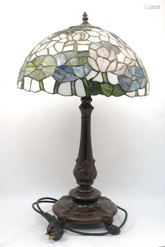 A Tiffany style stained leaded glass lamp, 70cm high, together with a 20th century milk glass and