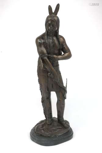 A large bronzed Native American sculpture, after Frederick Remington, 20th Century, raised on