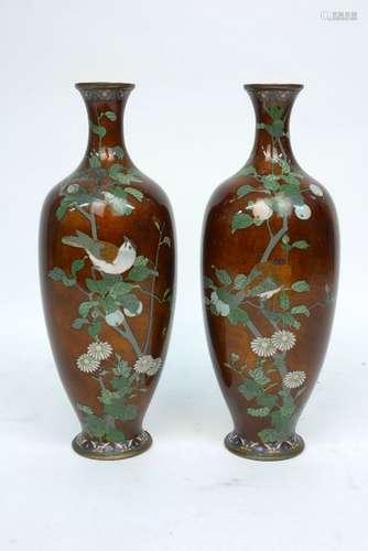 A pair of Japanese enamel vases, late 19th/early 20th century, decorated with peach trees and