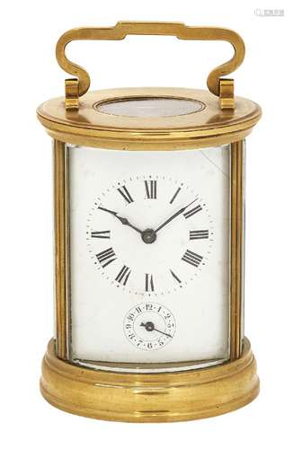 A French brass carriage alarm clock, 20th century, of cylindrical form, the white enamel dial with