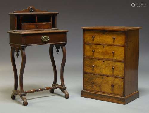 A Victorian mahogany and walnut chest of drawers, of diminutive proportions, with four graduated