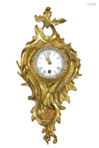 A French gilt metal cartel type clock, 20th century, the case moulded with acanthus leaf