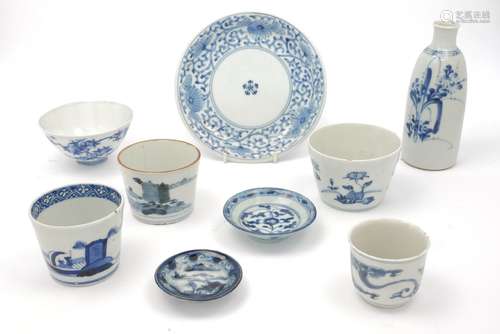 A large collection of Japanese blue and white porcelain, 19th/20th century, to include three sake