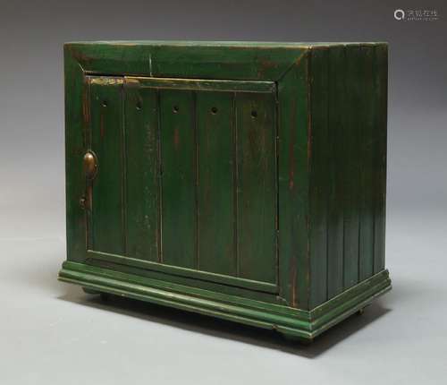 A green painted pine cupboard, late 19th, early 20th Century, with single cupboard door, enclosing