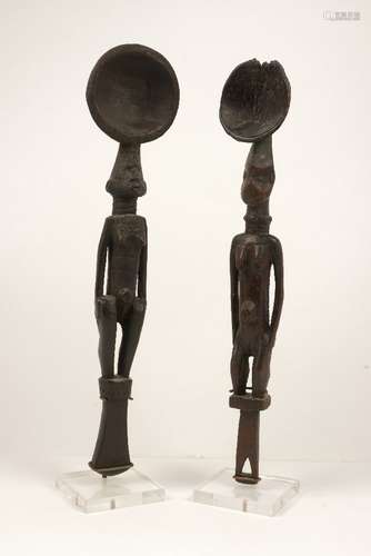 A pair of tribal hardwood female fertility figural spoons or ladles, 20th century, mounted on